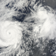 Illustration for article titled NASA Photographs Twin Giant Storms From Space